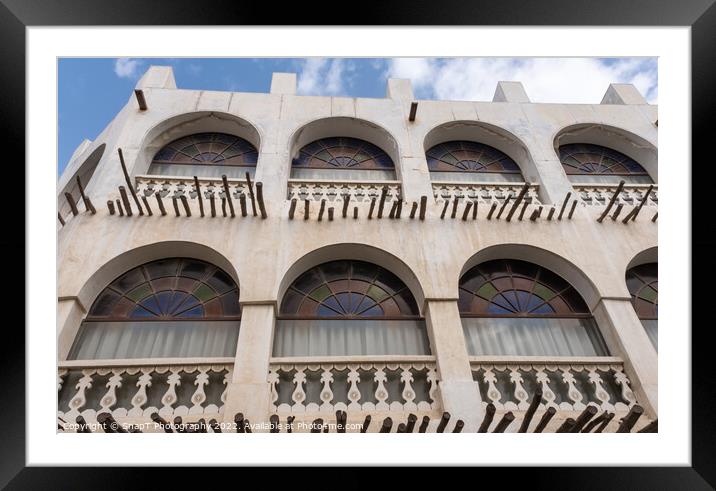 Qatari architecture in Souq Waqif, with bamboo poles, stain glass and arches Framed Mounted Print by SnapT Photography