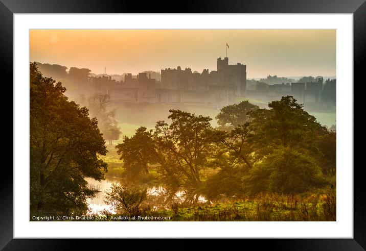Alnwick Castle at sunset Framed Mounted Print by Chris Drabble