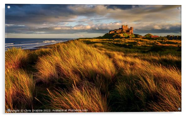Bamburgh Castle at sunset Acrylic by Chris Drabble