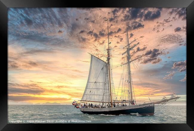 Sunset Sailing Beauty Framed Print by Roger Mechan