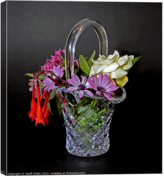 Bunch of mixed flowers in a cut glass basket Vase  Canvas Print by Geoff Childs