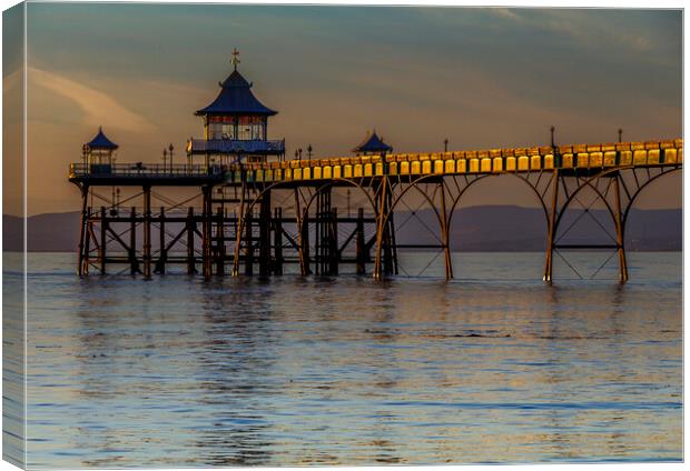 Clevedon Pier with the side panels catching some sunlight Canvas Print by Rory Hailes