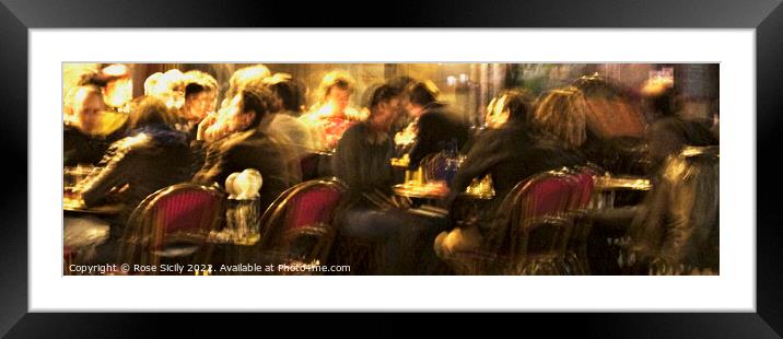 Customers sat outside a Parisien cafe in the evening eating and drinking. Framed Mounted Print by Rose Sicily