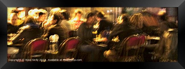 Customers sat outside a Parisien cafe in the evening eating and drinking. Framed Print by Rose Sicily