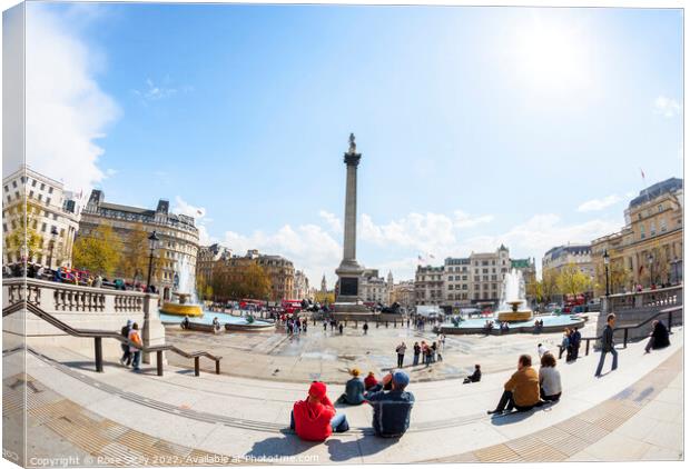 Trafalgar Square showing Nelson's Column, Lions and fountains, in Charing Cross, London Canvas Print by Rose Sicily