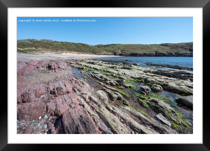 Differenent coloured rocks on Manorbier Beach Pembrokeshire Framed Mounted Print by Kevin White