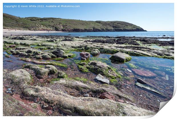 Rock pools at Manorbier Beach South Wales Print by Kevin White