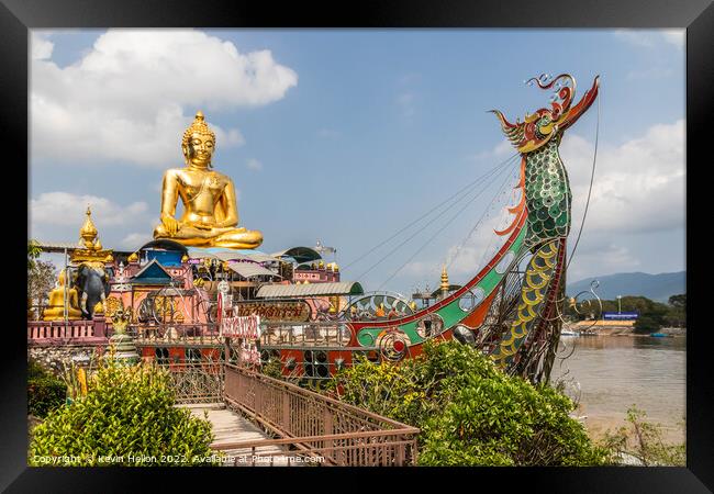 Buddah statue on boat on the Mekhong River  Framed Print by Kevin Hellon