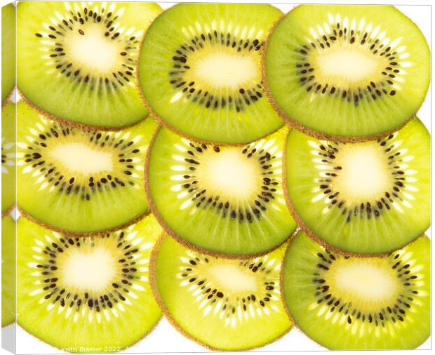 Kiwi fruit slices Canvas Print by Keith Bowser