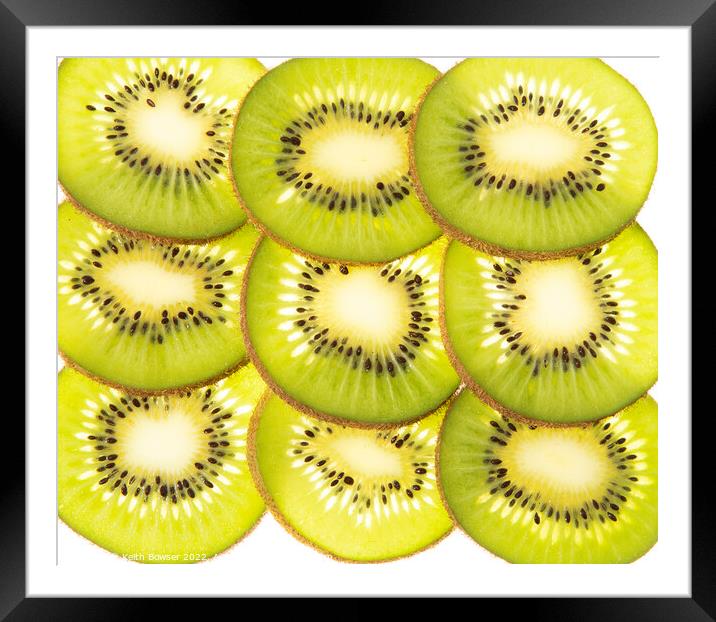 Kiwi fruit slices Framed Mounted Print by Keith Bowser