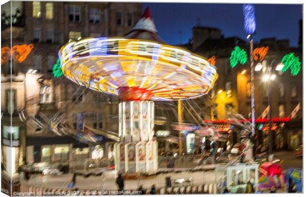 Chair-o-planes at the Christmas funfair George Square Glasgow Scotland UK Canvas Print by Rose Sicily