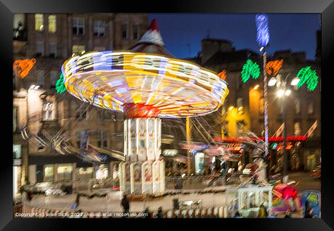 Chair-o-planes at the Christmas funfair George Square Glasgow Scotland UK Framed Print by Rose Sicily