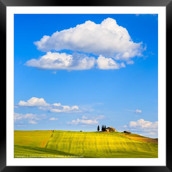 Tuscany, farm on the top of the hill and a cloud. Pienza, Italy Framed Mounted Print by Stefano Orazzini