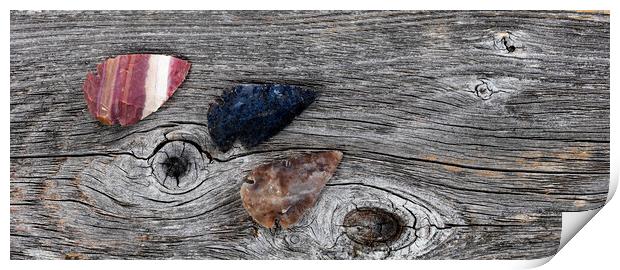 Three Native American arrowheads on rustic wood  Print by Thomas Baker