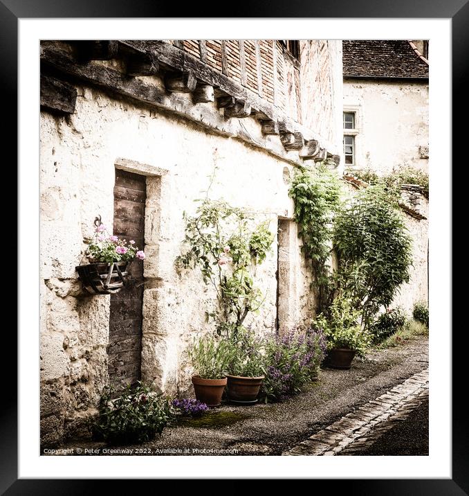 Pots Of Plants Outside A Residential Street In Medieval Issigeac Framed Mounted Print by Peter Greenway