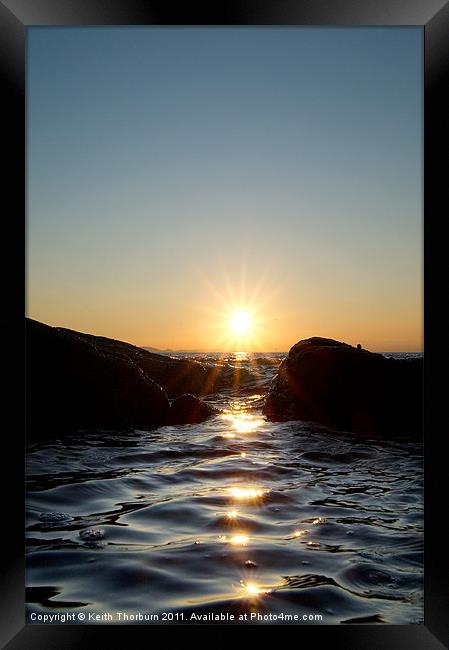 Sunset through the Rocks Framed Print by Keith Thorburn EFIAP/b