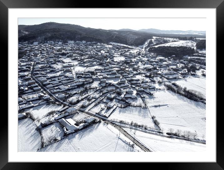 Snowbound village Framed Mounted Print by Martin Smith