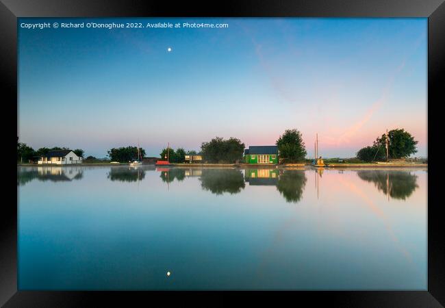 Reflections of huts on the Norfolk Broads at Horsey Framed Print by Richard O'Donoghue