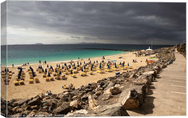 Playa Blanca beach with a storm approaching Canvas Print by Keith Bowser