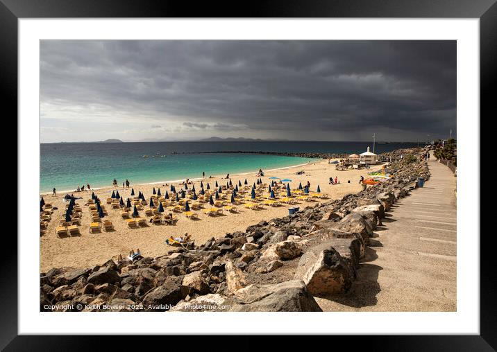Playa Blanca beach with a storm approaching Framed Mounted Print by Keith Bowser