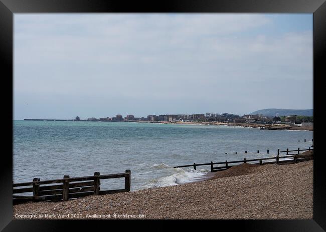 Eastbourne across the water. Framed Print by Mark Ward
