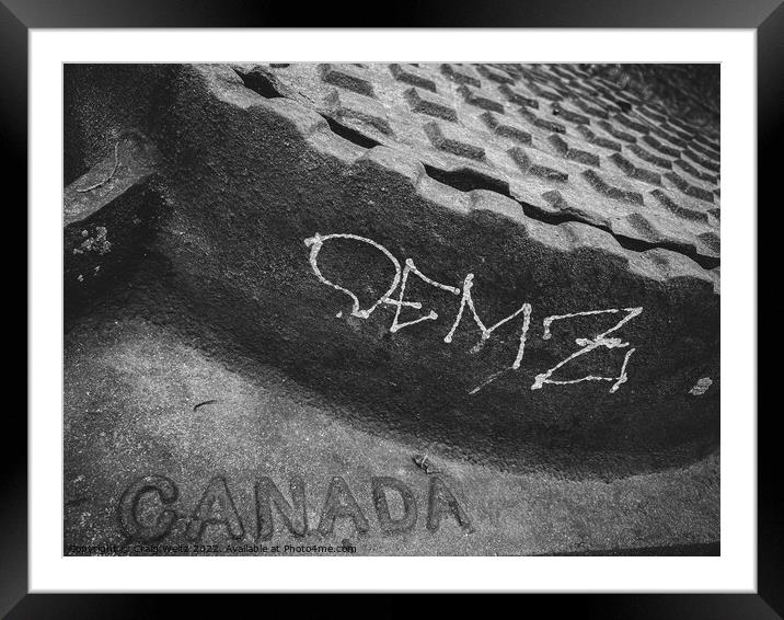 Graffiti on a manhole  Framed Mounted Print by Craig Weltz
