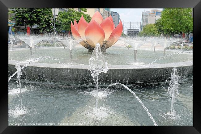 Water Fountain Nguyen Hue. Ho Chi Minh Vietnam  Framed Print by Kevin Plunkett