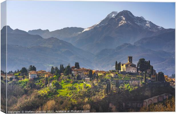 Barga town and Alpi Apuane mountains. Garfagnana, Tuscany Canvas Print by Stefano Orazzini