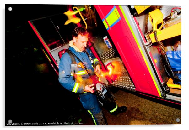 Firefighter in breathing apparatus and fire appliance with blurred lights at a fire Acrylic by Rose Sicily