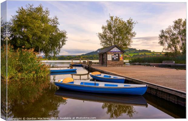Boats moored in Llangorse Lake, Brecon Beacons, Wales Canvas Print by Gordon Maclaren