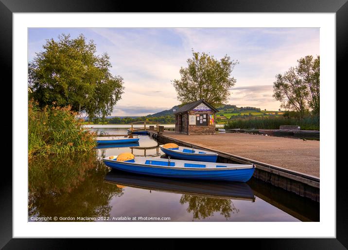 Boats moored in Llangorse Lake, Brecon Beacons, Wales Framed Mounted Print by Gordon Maclaren