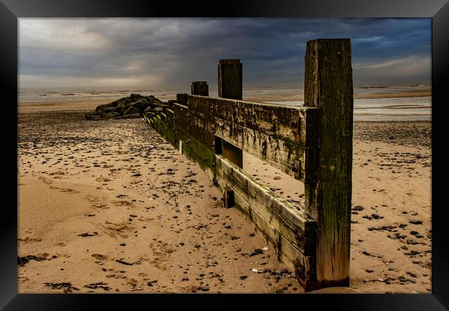 Storms Over the Beach Framed Print by Glen Allen