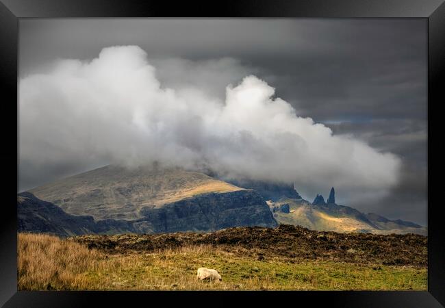 Heavy clouds over Storr Framed Print by Leighton Collins