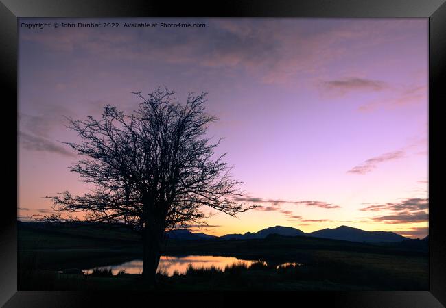 Dusk Upon Tewet Tarn Framed Print by John Dunbar