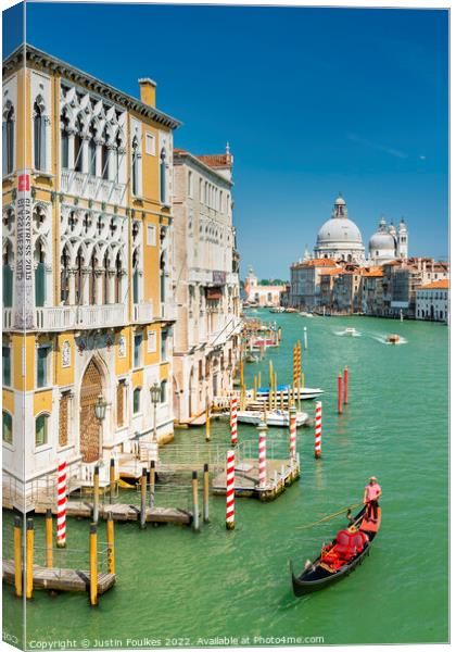 Gondolier, Grand Canal, Venice, Italy Canvas Print by Justin Foulkes