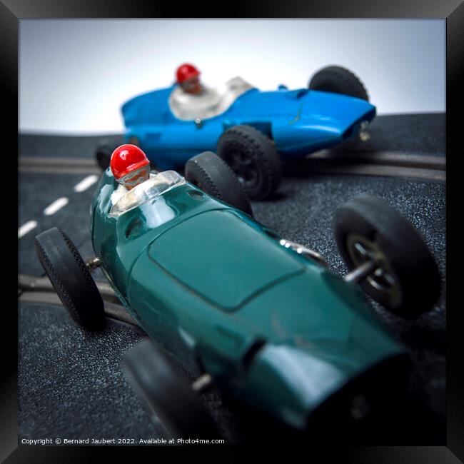 Two toy race cars Framed Print by Bernard Jaubert