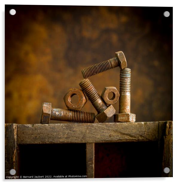 Rusty bolt on a wooden surafce Acrylic by Bernard Jaubert