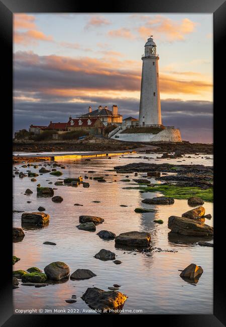 Sunrise at St Mary's Lighthouse. Framed Print by Jim Monk