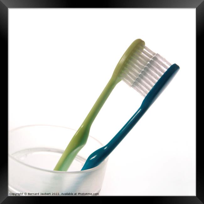 Two toothbrushs Framed Print by Bernard Jaubert