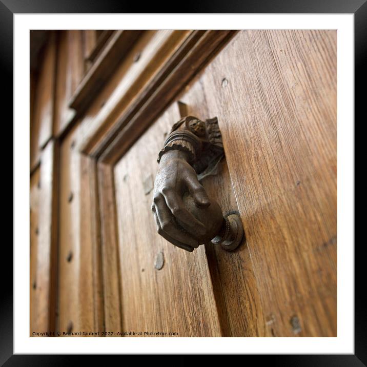 Hand-shaped doorknob Framed Mounted Print by Bernard Jaubert