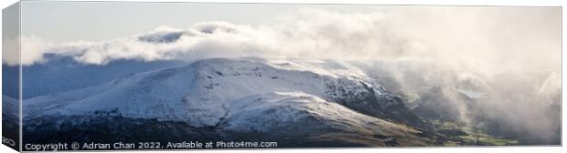 Clough Head and Thirlmere on a snowy day in the Lake District  Canvas Print by Adrian Chan