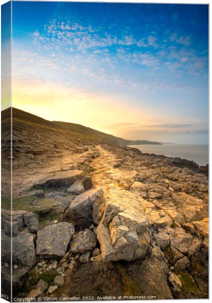 Sunrise Heritage Coast, South Wales Canvas Print by Simon Connellan