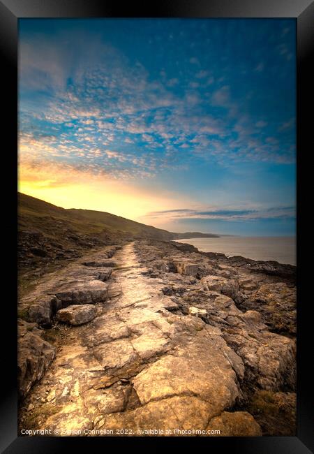 Sunrise Heritage Coast, South Wales Framed Print by Simon Connellan