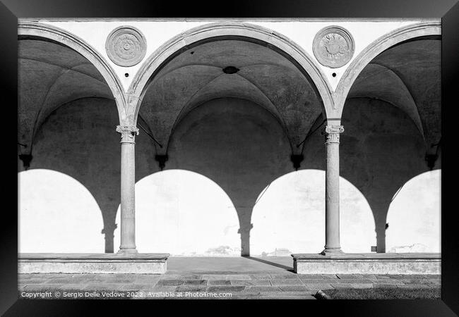 Large cloister in the Santa Croce church in Florence, Italy Framed Print by Sergio Delle Vedove