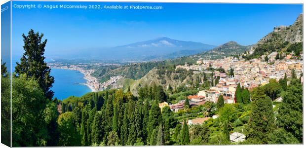Taormina with Mount Etna in background, Sicily Canvas Print by Angus McComiskey