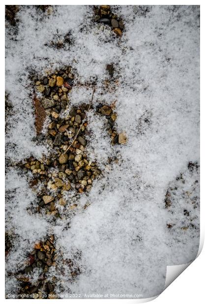 Vertical shot of a ground with small stones covered with the snow Print by Ingo Menhard