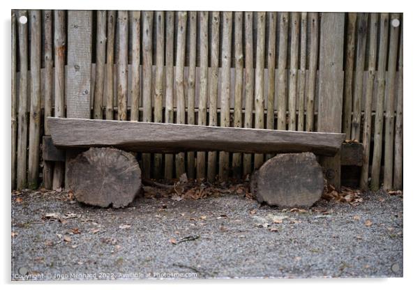 Bench made with logs of wood by a wooden fence Acrylic by Ingo Menhard
