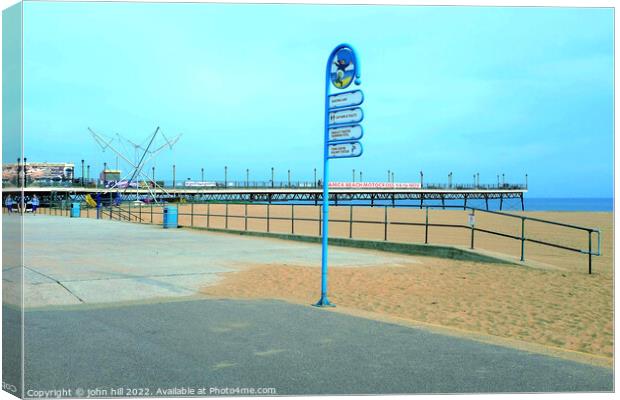 Skegness signs and pier. Canvas Print by john hill