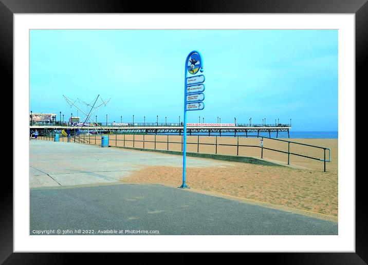 Skegness signs and pier. Framed Mounted Print by john hill