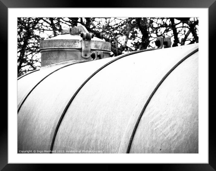Grayscale shot of a watering tank in a park Framed Mounted Print by Ingo Menhard